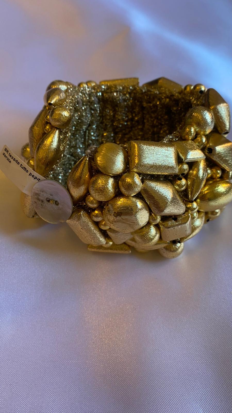 Golden nugget bracelet with mother of pearl clasp.
