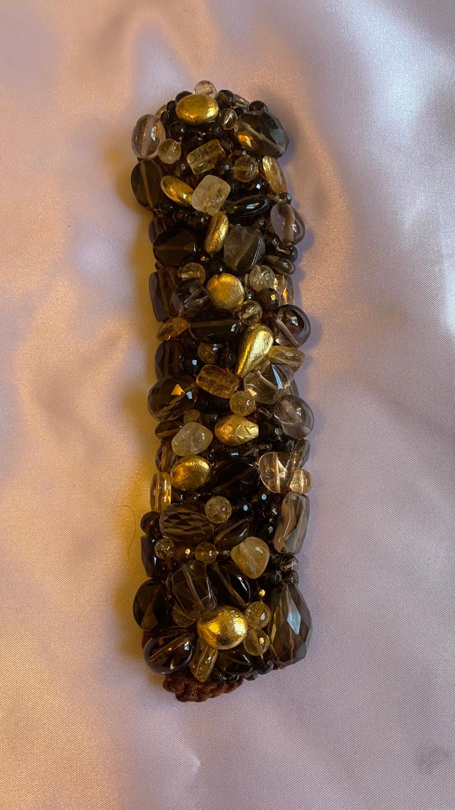 Bracelet with Brown Smoky Quartz, Citrine, Golden nuggets, and a mother of Pearl clasp.