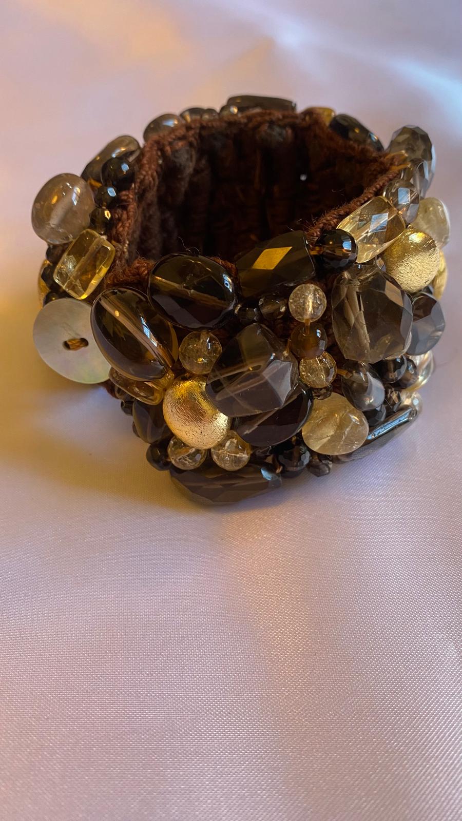 Bracelet with Brown Smoky Quartz, Citrine, Golden nuggets, and a mother of Pearl clasp.