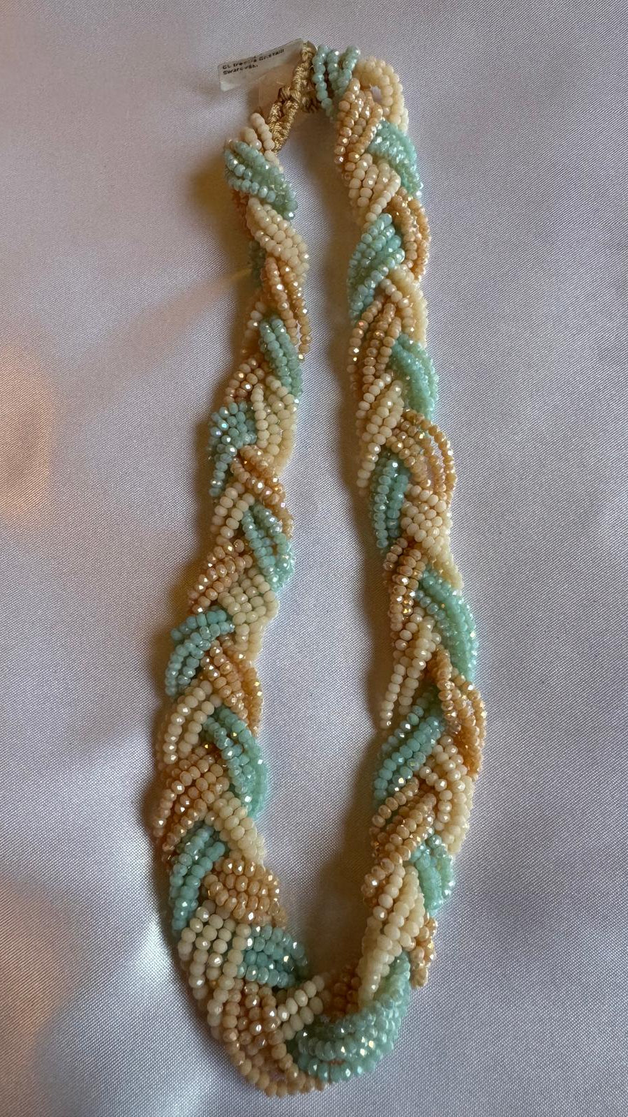 Braided necklace with crystals and Swarovski crystals.
