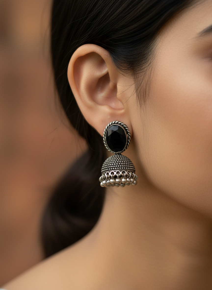Silver black stone dome jhumka metallic earrings