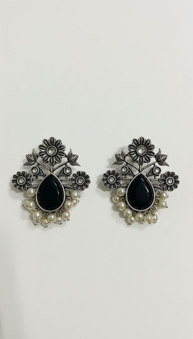 Oxidised german silver stud Black centeral stone with pearls Border Earings