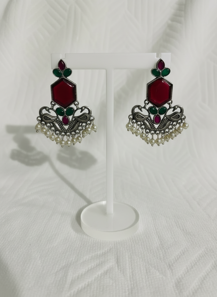 Silver plated traditional drop with red stone and pearls border earrings